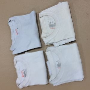 Four pack of worn/used PT tee shirts